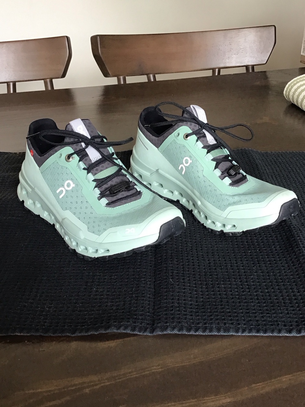 On Cloudultra trail running shoes in a mint green colorway. Excellent condition.